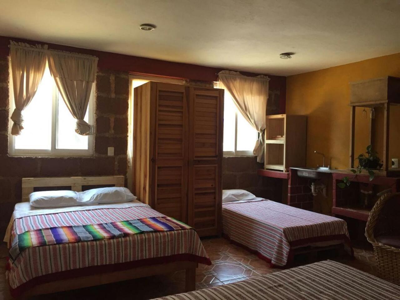 Hotel Las Fumarolas De Don Goyo โชลูลา ภายนอก รูปภาพ