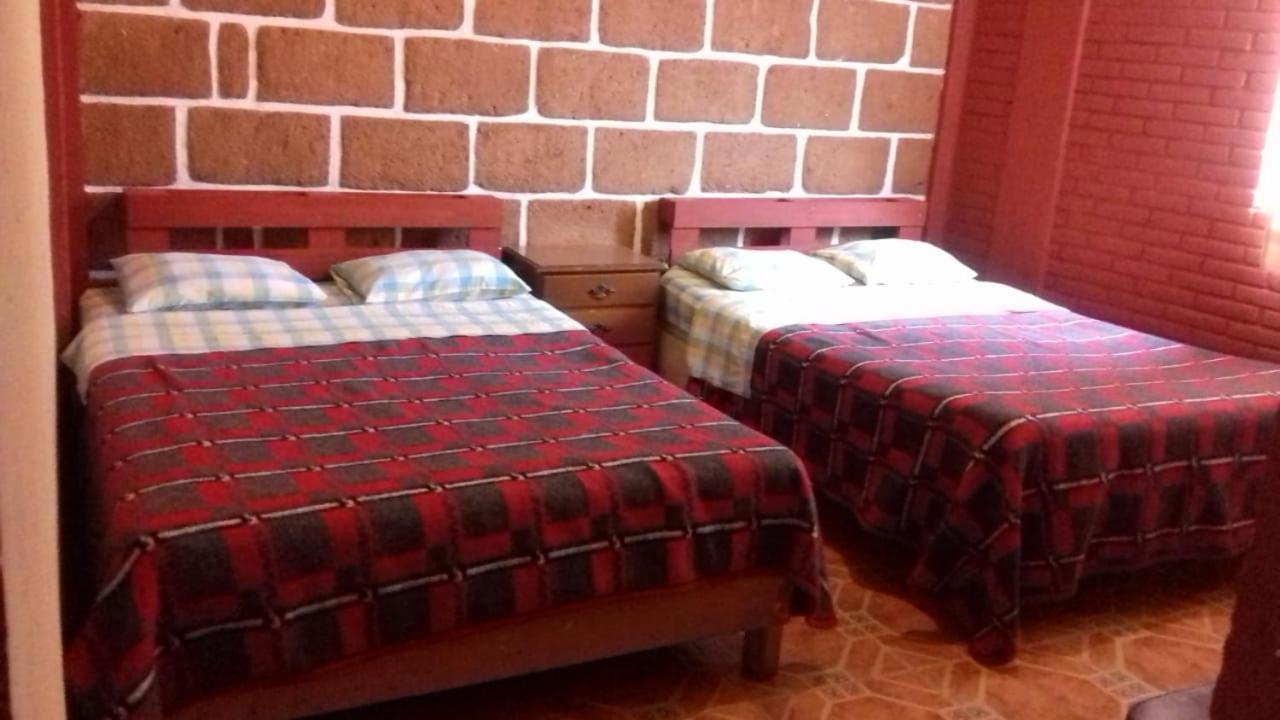 Hotel Las Fumarolas De Don Goyo โชลูลา ภายนอก รูปภาพ