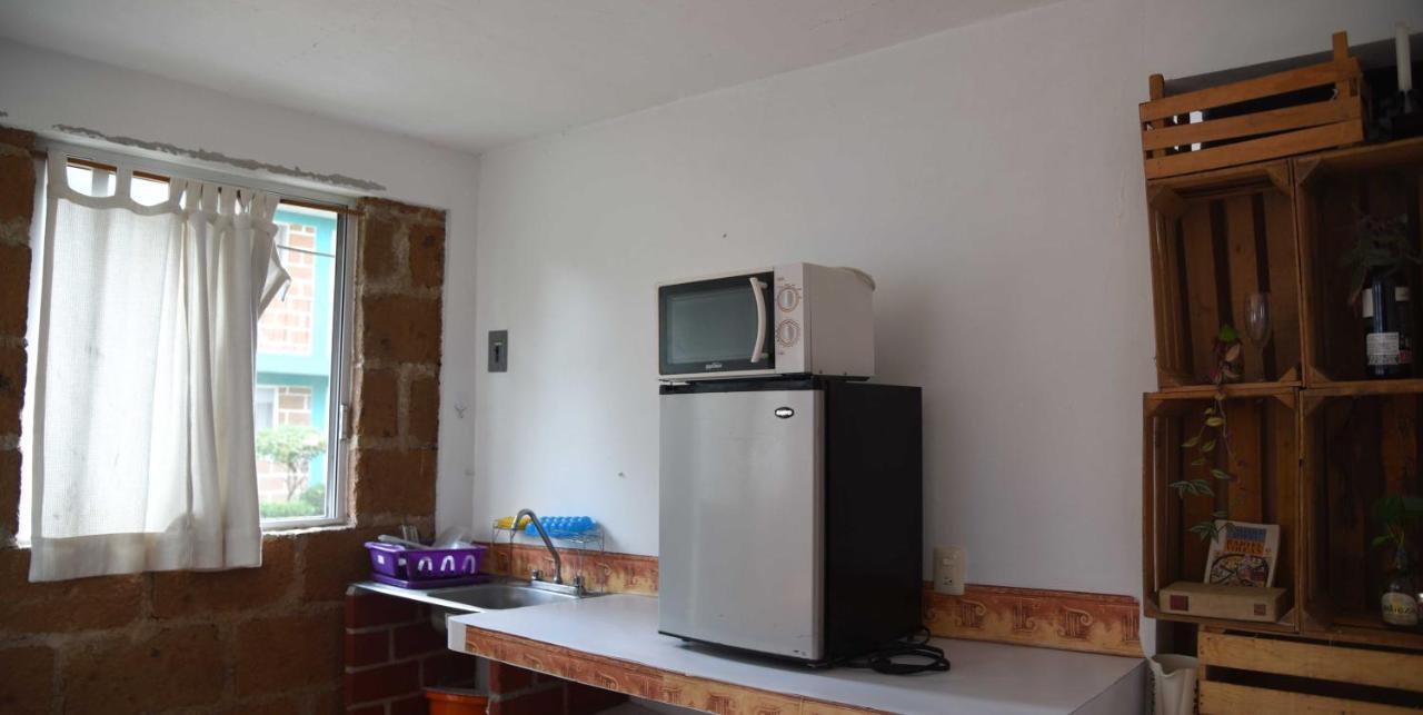 Hotel Las Fumarolas De Don Goyo โชลูลา ภายนอก รูปภาพ